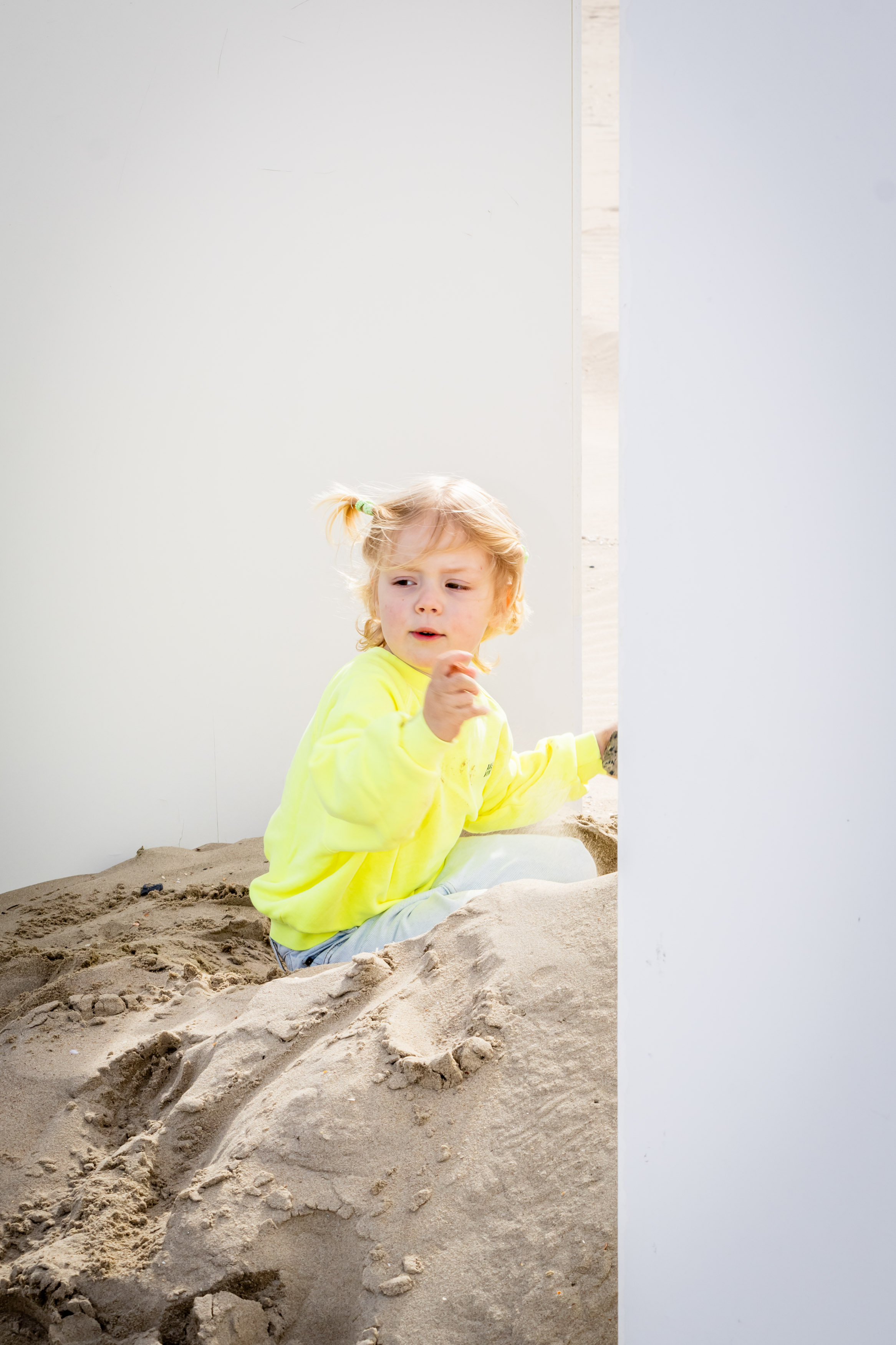 Child in yellow jacket